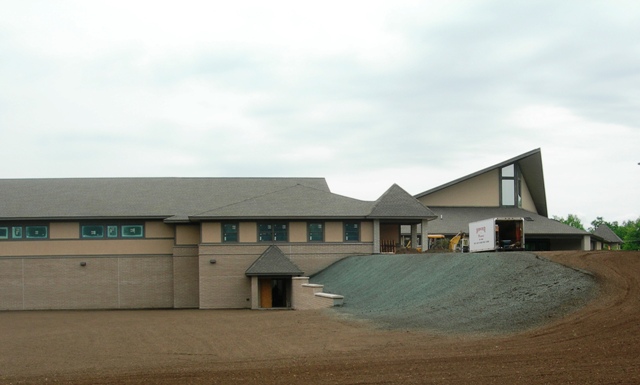 front elevation picture of Classroom Addition at berm beside parking lot
