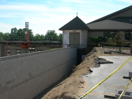 picture of front elevation of Word of Life Church taken from the parking lot - a closer look at the addition's lower wall