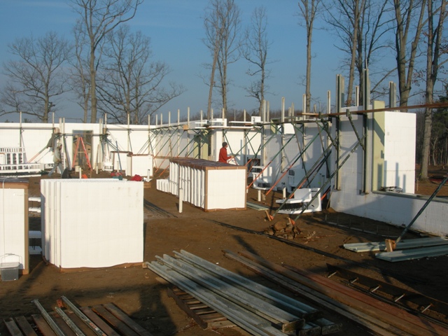 picture of workers installing ICF building elements for Camp Grayling Dining Hall