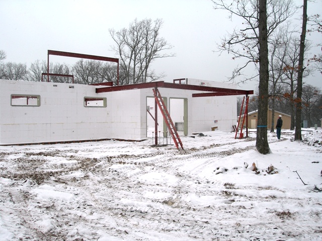 picture of snow covered site showing ICF walls and structural steel joists for Camp Grayling Dining Hall