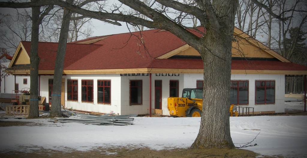 picture dining hall under construction with red roof installed