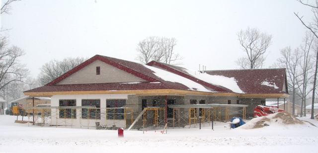 picture of dining hall surrounded by masonry scaffolding