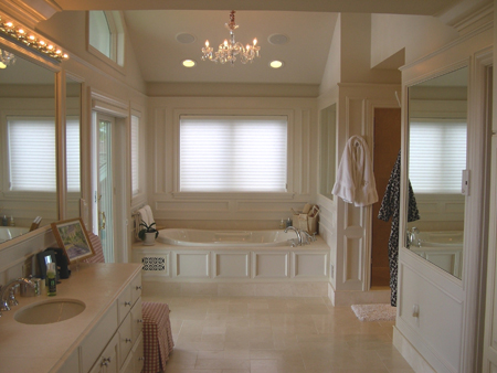 this interior photo is of the master suite bath for the home with french doors leading onto a deck shared with the master bedroom - white on white elegance that is still comfortable - think luxury spa meets a cottage on the beach